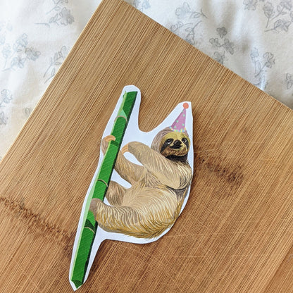 Sloth in a party hat sticker